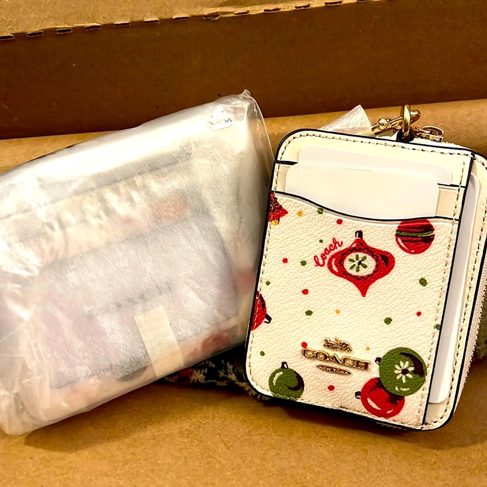 New, Authentic Coach coin/ID wristlet.